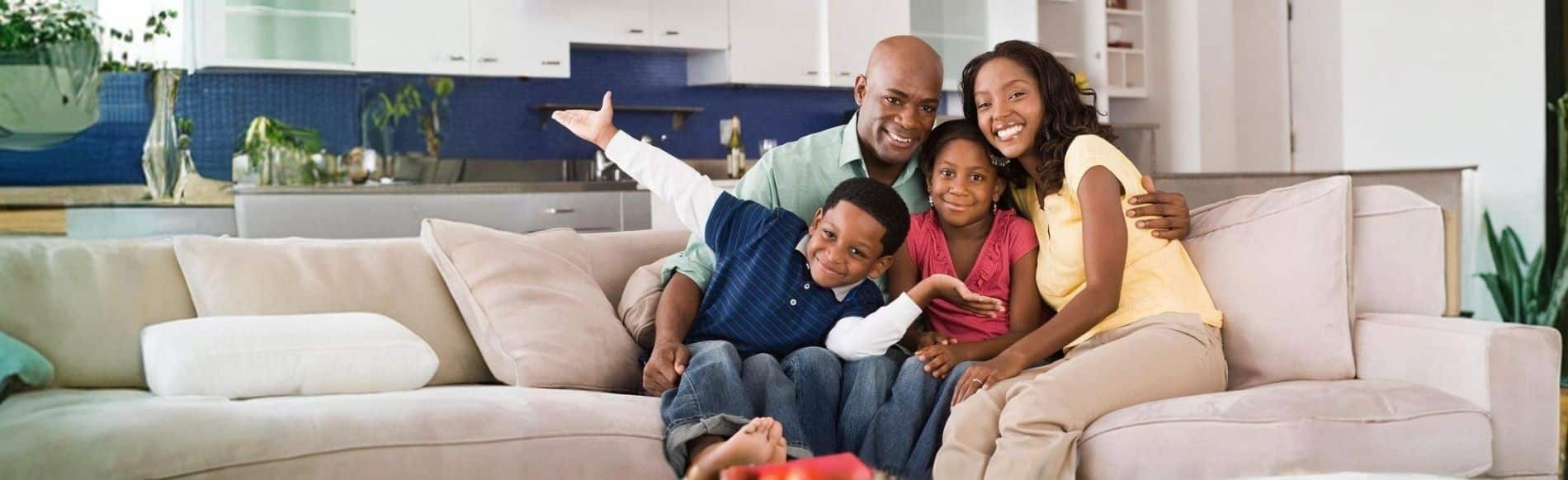 Family sitting together at home, representing Healthy Home mold testing services